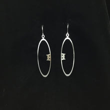“Peek-a-boo" stainless steel oval hoop earrings, steel or gold-plated