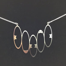 "Peek-a-boo" cat necklace, steel or gold-plated